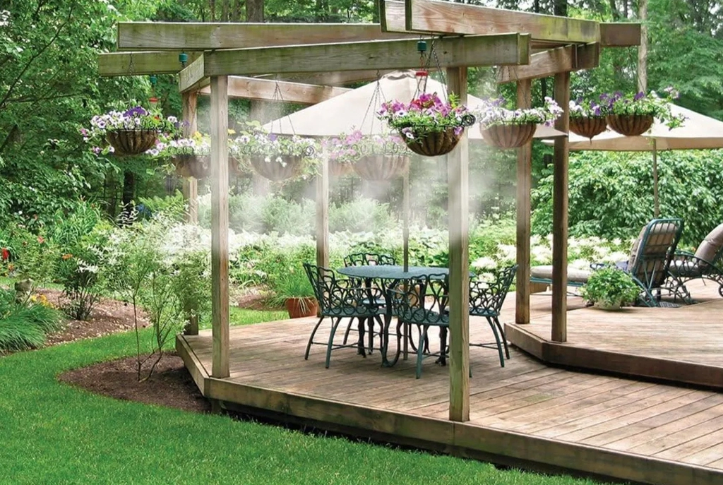 outdoor area cooling using fog and mist systems